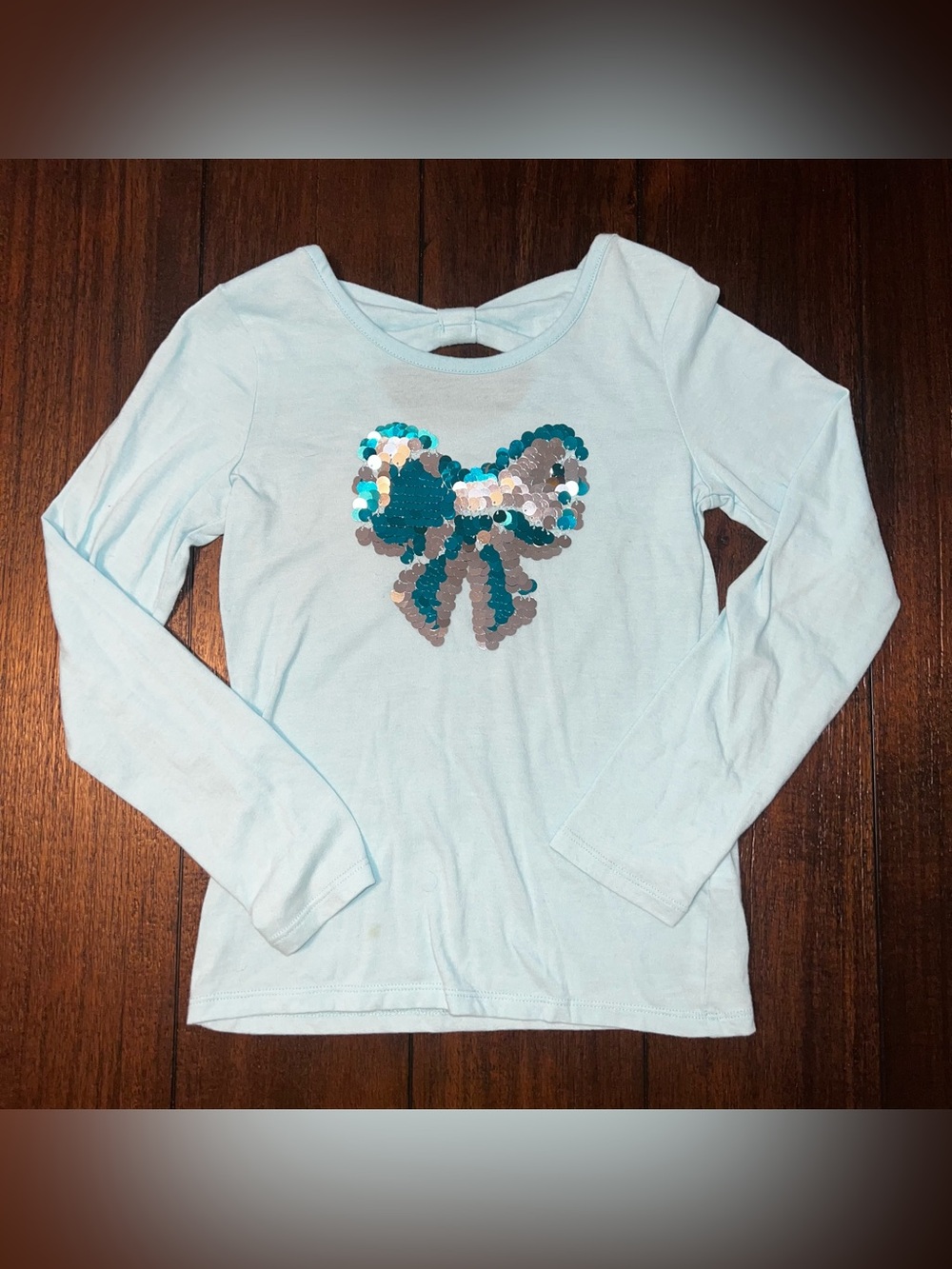 SO Light Blue Long-Sleeve Top with Sequin Bow